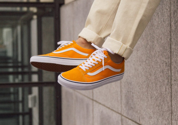 orange vans on feet