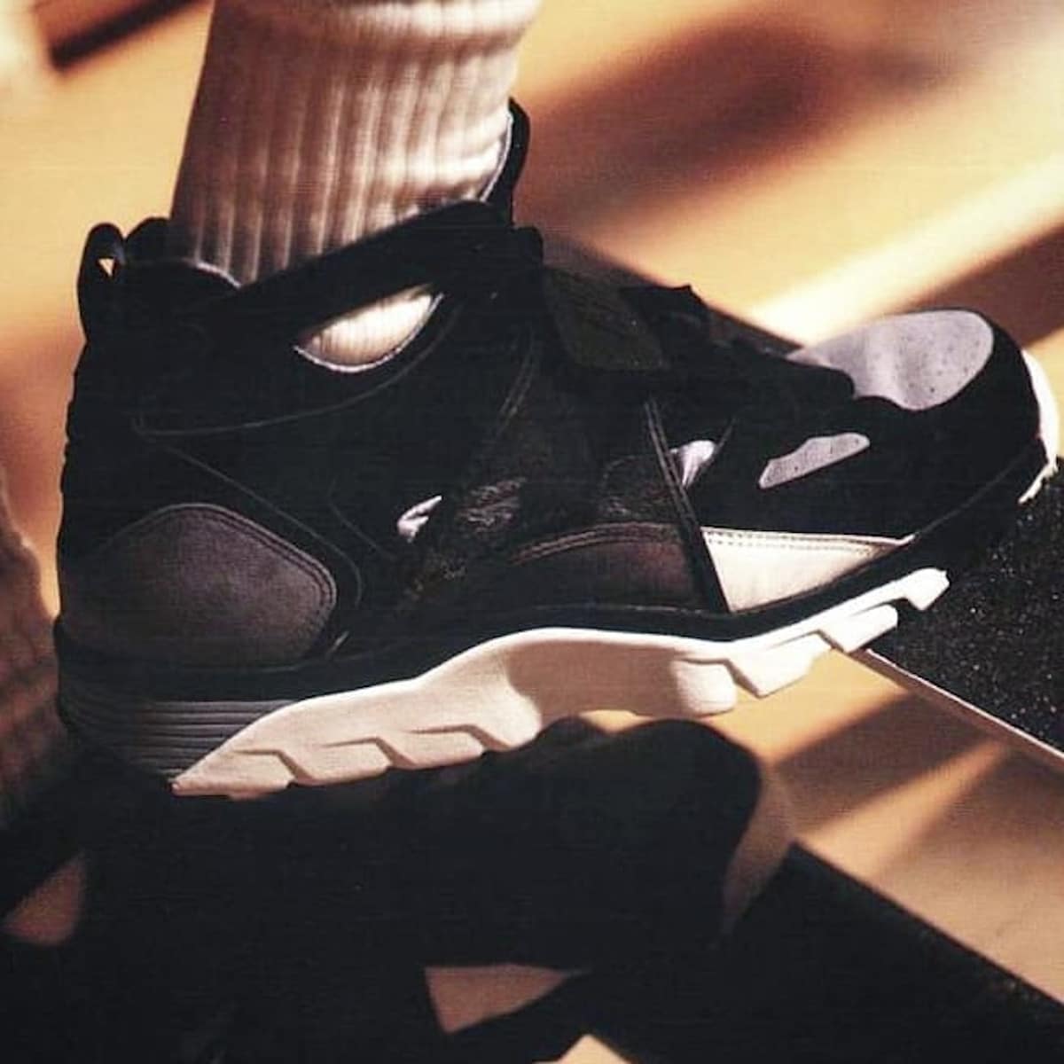 La Nike Air Trainer Huarache OG dans la pub Bad Hip de 1991 via Nike Talk